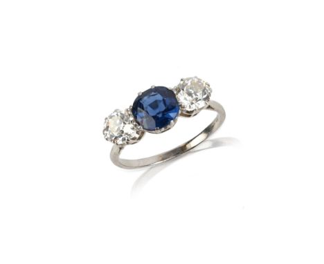 A sapphire and diamond three stone ring, set with a circular-cut sapphire and diamond shoulders in platinum, size S