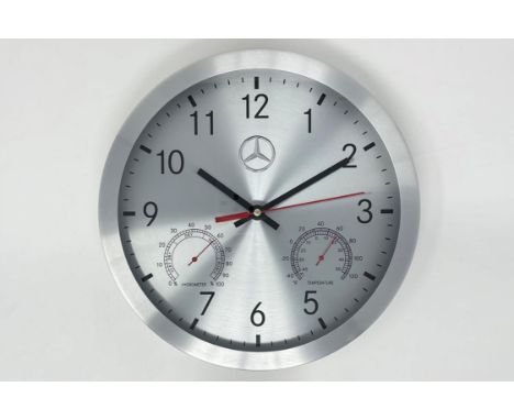 With two subsidiary dials displaying Hydrometer and Temperature gauges, sweeping second hand and a three-pointed star at noon