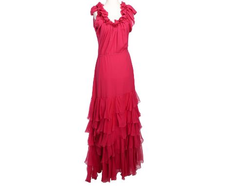CHRISTIAN DIOR Abendkleid, Gr. 38. 100% Seide in Magenta mit dekorativen Volants, Faltendekor und Rüschen am Ausschnitt. Neuw