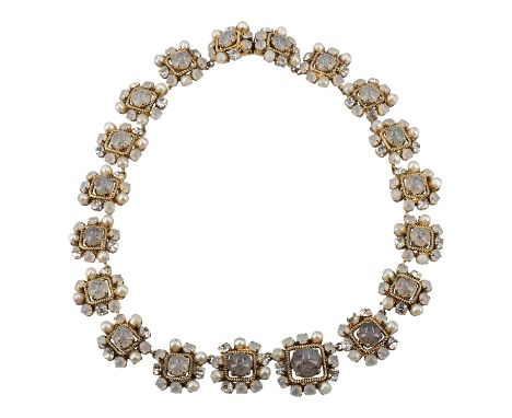 CHRISTIAN DIOR VINTAGE Collier, Koll.: 1964. Florales Design, mittig ein Stein, goldfarbene Fassung, mit Perlen und Steinen u