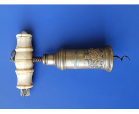 A Victorian brass barrel patent corkscrew with turned bone handle.