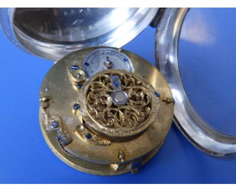 A 19thC French open-faced silver pocket watch with convex white enamel dial.