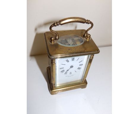 A Mappin & Webb retailed French carriage clock – movement a/f.