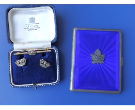 A pair of  earrings set with a coronet and pearls in yellow metal and a matching '9ct' bar brooch together with a silver ciga