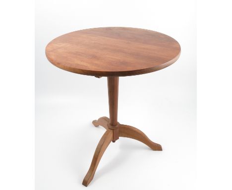 A Cotswold School mahogany tripod table, the circular top raised on a chamfered column to three outswept supports, with stick