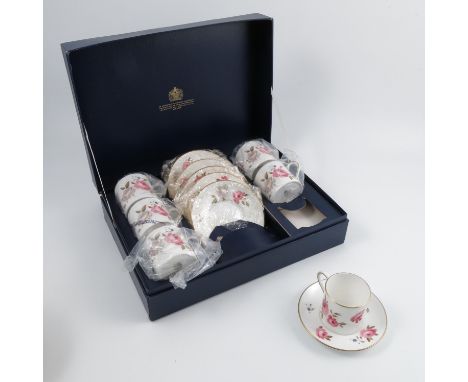 A Royal Worcester cased coffee set, of six cups and saucers, decorated in the Marissa pattern   Condition report:  Good condi