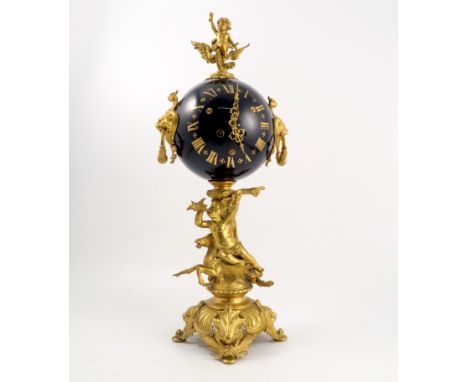 A 19th century German mantel clock, the chiming movement stamped Lenzkirch, in a blue enamel ball case, with gilt Roman numer