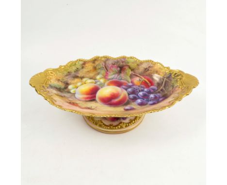 A Royal Worcester pedestal oval dish, decorated with fruit to a mossy background by T Lockyer, raised on a circular foot, wit