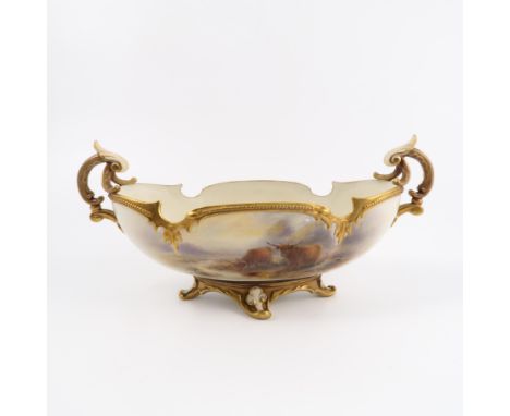 A Royal Worcester centre piece, of oval form with shaped edge and a pair of gilt handles, the front hand painted with Highlan