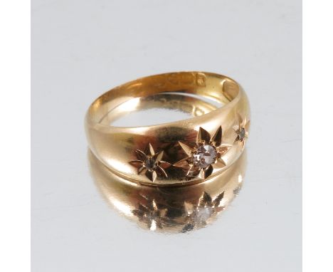 An 18ct gold diamond set gypsy ring