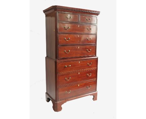 A Georgian mahogany chest, on chest with two short drawers over three graduated long drawers to the upper section, below a de