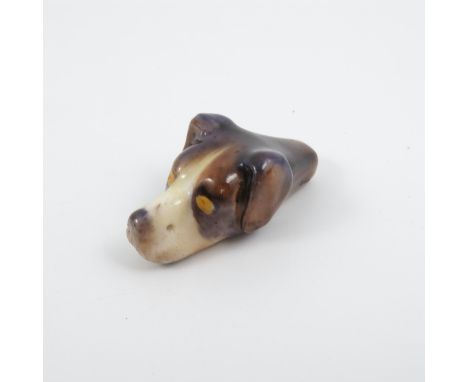 A Royal Worcester hounds head whistle   Condition report:  Muzzle is yellow but good condition