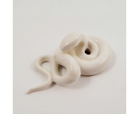A unmarked Royal Worcester netsuke, modelled as a coiled snake, made by the factory exclusively for Mr Henry Sandon circa 197