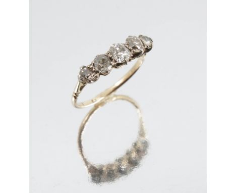 A five stone diamond ring, the graduated old cuts totalling approximately 0.7 carats, finger size L 1/2, 1.5g gross   Conditi