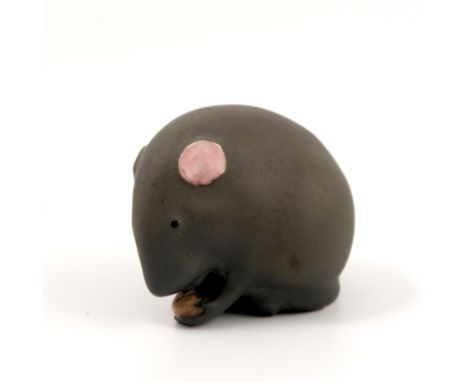 A Royal Worcester netsuke, modelled as a matte black mouse, dated circa 1913, height 1.25ins   Condition report:  Good condit