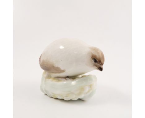 A Royal Worcester netsuke, modelled as a white quail, dated circa 1913, height 2ins   Condition report:  Restoration to leaf 