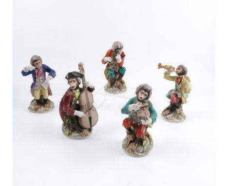 Five porcelain figures, from a German monkey band, each playing musical instruments, height approximately 6ins   Condition re