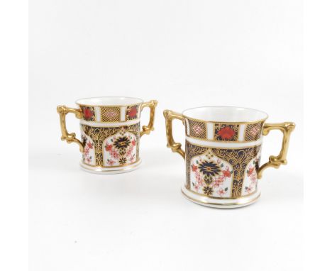 Two Royal Crown Derby loving mugs, decorated in the 1128 Imari pattern, dated 1982 and 1988, height 3ins   Condition report: 