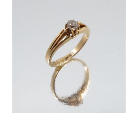 An 18ct gold solitaire diamond ring