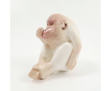 A Royal Worcester netsuke, modelled as an Ape, dated circa 1913, height 3ins   Condition report:  Cracked to arm and crazed
