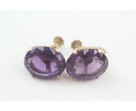 A PAIR OF 9CT GOLD OVAL CUT AMETHYST EARRINGS,Weight: 7.5gms 