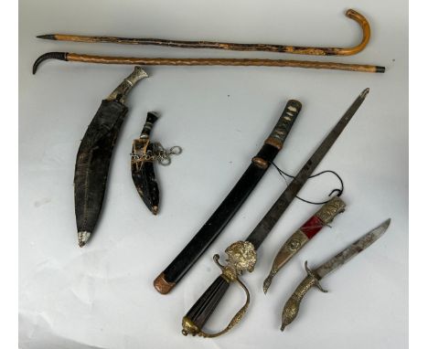 A COLLECTION OF MILITARIA TO INCLUDE A GREEK INDEPENDENCE DAGGER, TWO KUKRIS, A JAPANDESE KATANA WITH SHAGREEN HANDLE, A DRES