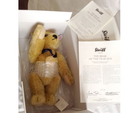 A modern Steiff Bear of The Year 2009, 27cm, with certificate, original box and packaging, together with another Bear of The 