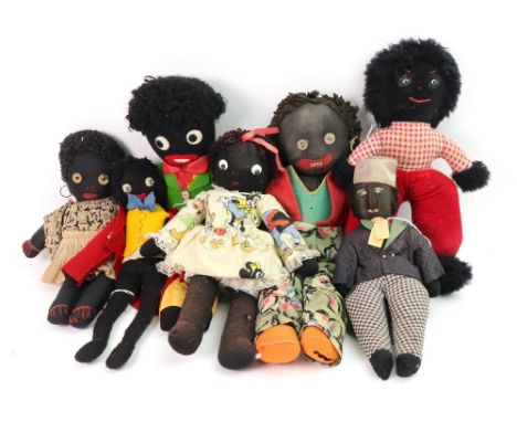 A group of vintage hand stitched fabric and stocking Golliwogg dolls in various costumes and sizes, (7).