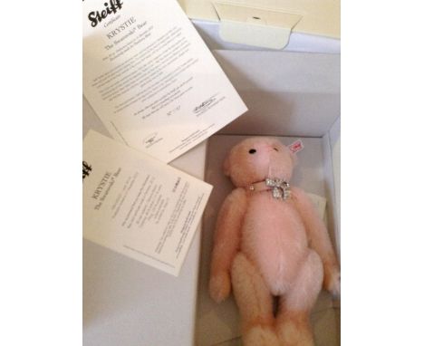 A modern Steiff Krystabelle Bear, 28cm, with certificate, box and packaging, together with a modern Steiff Krystie Swarovski 