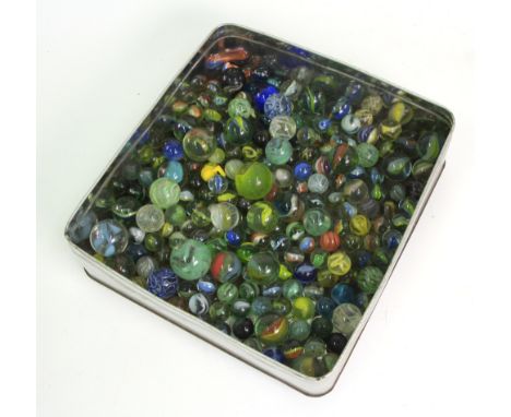 A large collection of vintage glass marbles, in a tin box (qty).