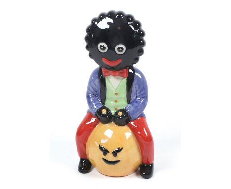A Carlton Ware trial figure "Golliwogg on a space hopper", probably after a design by Francis Joseph, 23cm, printed marks and