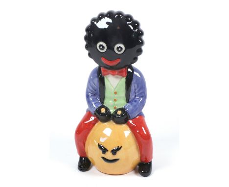 A Carlton Ware trial figure "Golliwogg on a space hopper", probably after a design by Francis Joseph, 23cm, printed marks and