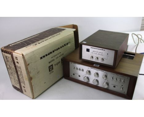 A Marantz console stereo amplifier, model 1060, serial no, 520599, 43cm wide, together with a Marantz, model CD-400B CD-4 dis