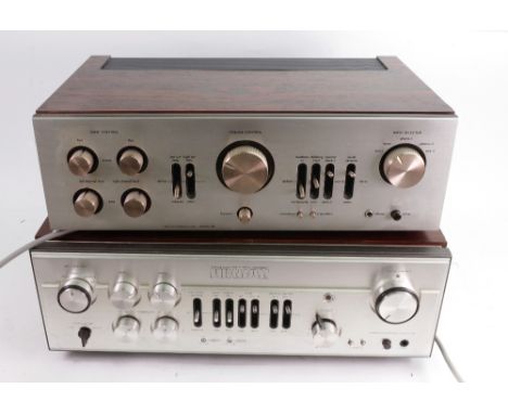 A Luxman Ultimate High Fidelity stereo component, integrated amplifier, model L-100 and a Luxman solid state integrated ampli