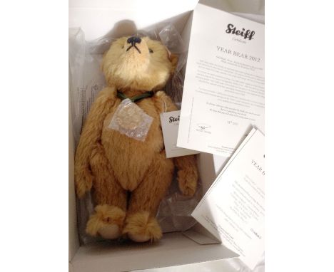 A modern Steiff Year Bear 2012, 30cm, with certificate, box and packaging, together with a modern Merrythought London 2012 Ol