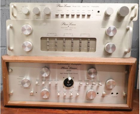 A Phase Linear 4000 Autocorrelation Preamplifier High Fidelity Control Console, together with a Phase Liner Model 6000 Series