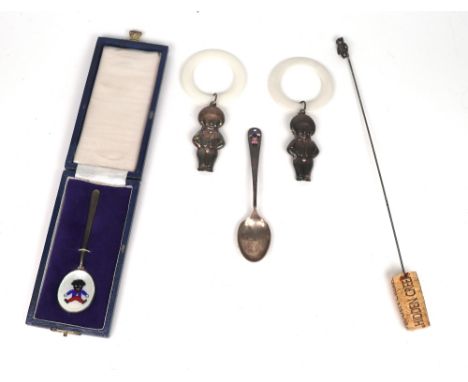 A silver christening spoon, the bowl enamelled with a seated Golliwogg, hallmarked Birmingham, another with enamel figure in 