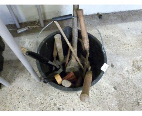 A bucket of assorted tools