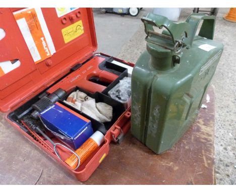 A Hilti DX450 piston tool together with a small fuel can
