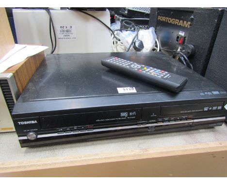 A Toshiba RD-XV48DT Freeview HDD/DVD/VCR recorder with remote and printed instructions