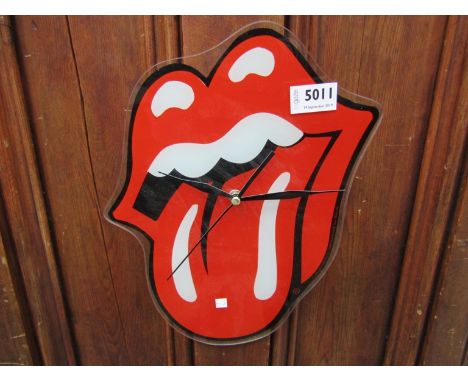 A Rolling Stones glass clock