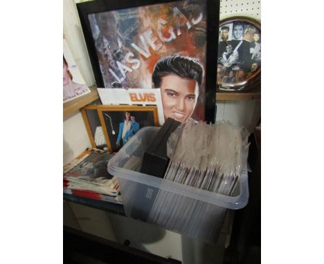 An Elvis Presley coffee table book, clock, ephemera etc together with a quantity of film magazines