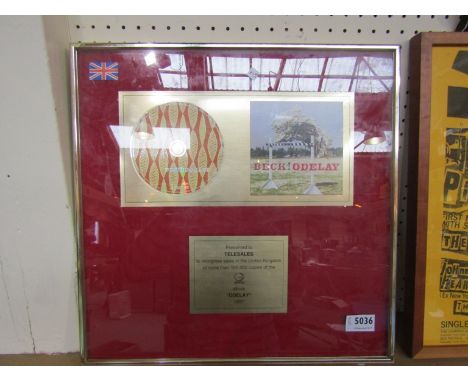 A framed and glazed Beck 'Odelay' presentation CD