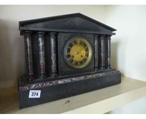 A 19th century mantel clock - striking on a gong with pendulum and key
