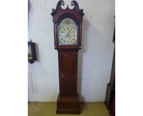 An 18th/19th century oak eight day striking longcase clock with a painted 12" arched dial having secondary dial and calendar 