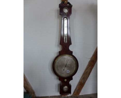 A 19th century mahogany barometer with a thermometer above a silvered dial and spirit level