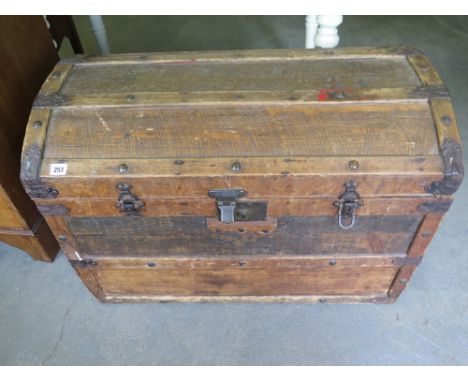 A pine domed top trunk with metal strapping - Hight 56 cm x Width 84 cm x Depth 50 cm 