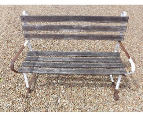 A wrought iron wooden slatted garden bench - Width 1.2 m 