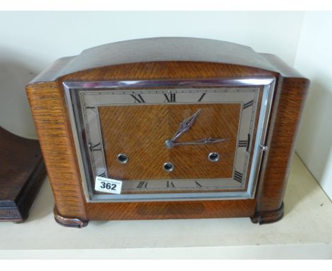 An eight day oak Art Deco mantel clock with Westminster and Whittington chimes, strikes/S/F
Condition report: Working with ke