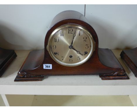 An eight day oak case mantel clock with Westminster and Whittington Chimes
Condition report: Working with key 